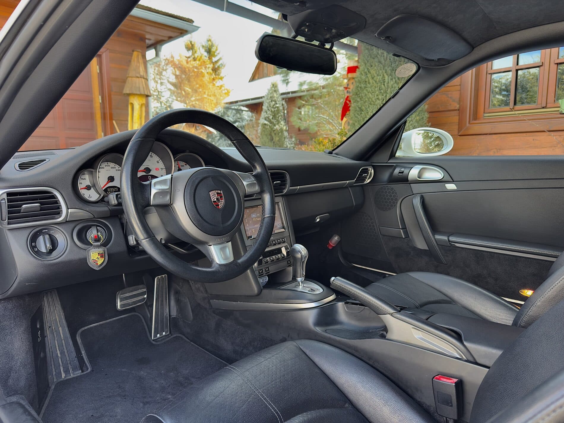 2008 Porsche 997 Carrera S, biela kupé, 83 929 km